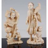 A Japanese Meiji period carved ivory okimono, of a robed figure with bird of prey and attendant