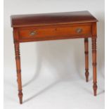 A Regency style mahogany side table, having single drawer, raised on ring turned supports, w.76cm,