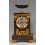 A late 19th century French bronze and gilt metal mantel clock, the silvered dial signed C.H. Dubois,