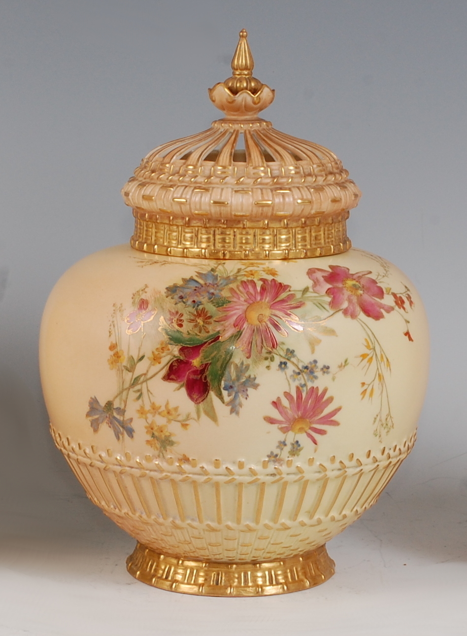 *A large Royal Worcester porcelain blush ivory pot pourri, of globular form, having pierced dome