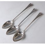 Three George III silver stuffing spoons, engraved to the terminal with a swan above the legend '
