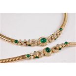 An 18ct emerald and diamond necklace and matching bracelet, the central oval emerald cabochon,