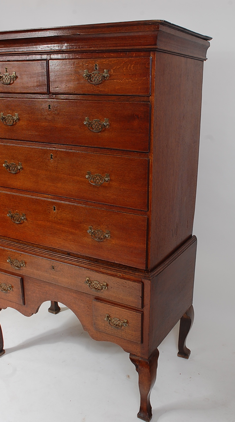 A George III oak chest-on-stand, having a cavetto cornice over two short and three long drawers, the - Image 2 of 3