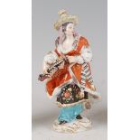 A late 19th century Meissen porcelain figure of a Malabar musician, after the original by Johann