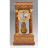 A late 19th century French faded rosewood and marquetry inlaid portico clock, with gilt metal