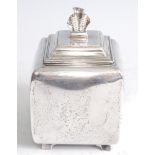 *A 19th century silver tea caddy, of convex cubic form, the sliding slide with hinged handle, 8.1oz,