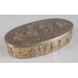 A late 19th century Hanau silver gilt table snuff-box, of oval form, the hinged cover repousee