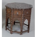 *A late 19th century Moorish occasional table, the octagonal top profusely decorated with bone