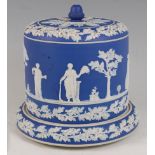 A Victorian blue jasper ware Stilton dish and cover, having acorn finial above a typical frieze of