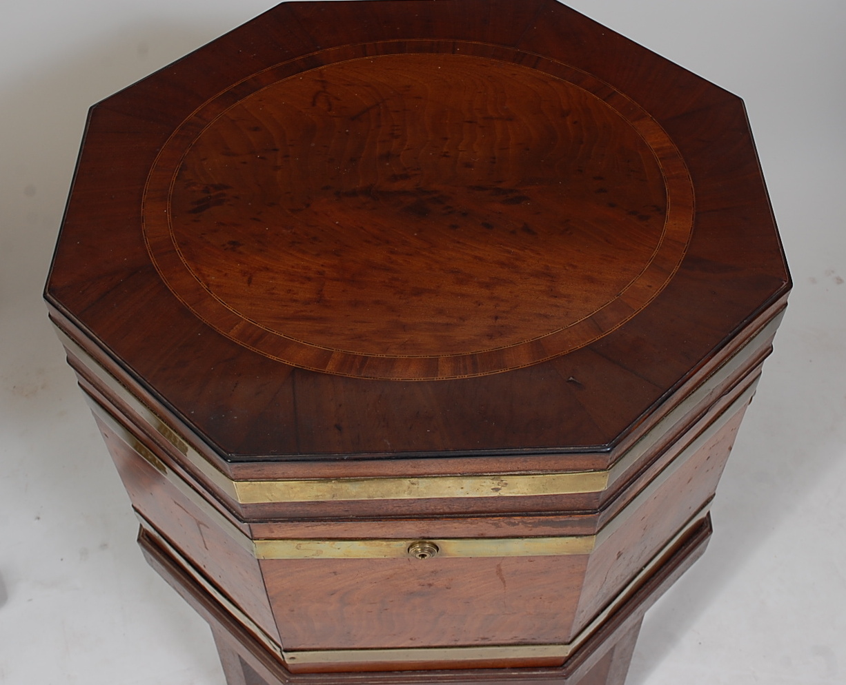 A Regency mahogany celleret, of brass bound octagonal form, the top with fielded oval crossbanded - Image 2 of 2