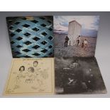 Four vinyl LP records by The Who, comprising Tommy 1969, Who's Next 1971, Quadrophenia 1973, and The