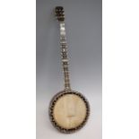 An early 20th century five-string Parlour Banjo by W. Temlett, stamped to neck, with mother of pearl