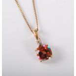 A 14k pink mystic topaz pendant, 8mm wide, with 9ct gold chain, (3.8g), cased