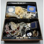 A box of miscellaneous items to include an Elizabeth II Silver Jubilee commemorative crown, a