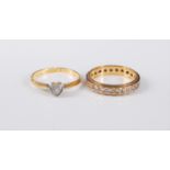 Two diamond rings: a 9ct diamond eternity ring, estimated approx. 0.25cts, in white and yellow gold,