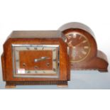 An Art Deco oak cased mantel clock, having a silvered dial with Roman numerals, and chiming