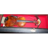 A cased Hungarian students violin (a/f)