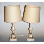 A pair of onyx and brass mounted table lamps with shades, height 48cm including shades