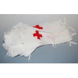 A large collection of Red Cross cotton armbands