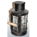 A WWI style black painted iron trench lantern, with swing handle, h.31cm (excluding handle)
