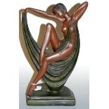 An Art Deco style resin figural table lamp base, in the form of a semi-nude dancer, h.36cm