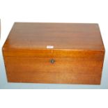 An Edwardian mahogany box, of rectangular form, the hinged lid revealing pull-out twin handled tray,