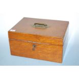 An Edwardian oak deed box, of rectangular form, having recessed brass handle and lined interior, w.