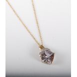 A 9ct gold fancy cut mauve CZ pendant with white CZ mount and integrated hanging bale, stamped 375