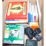 A box of camera related equipment, and a quantity of 16mm film reels