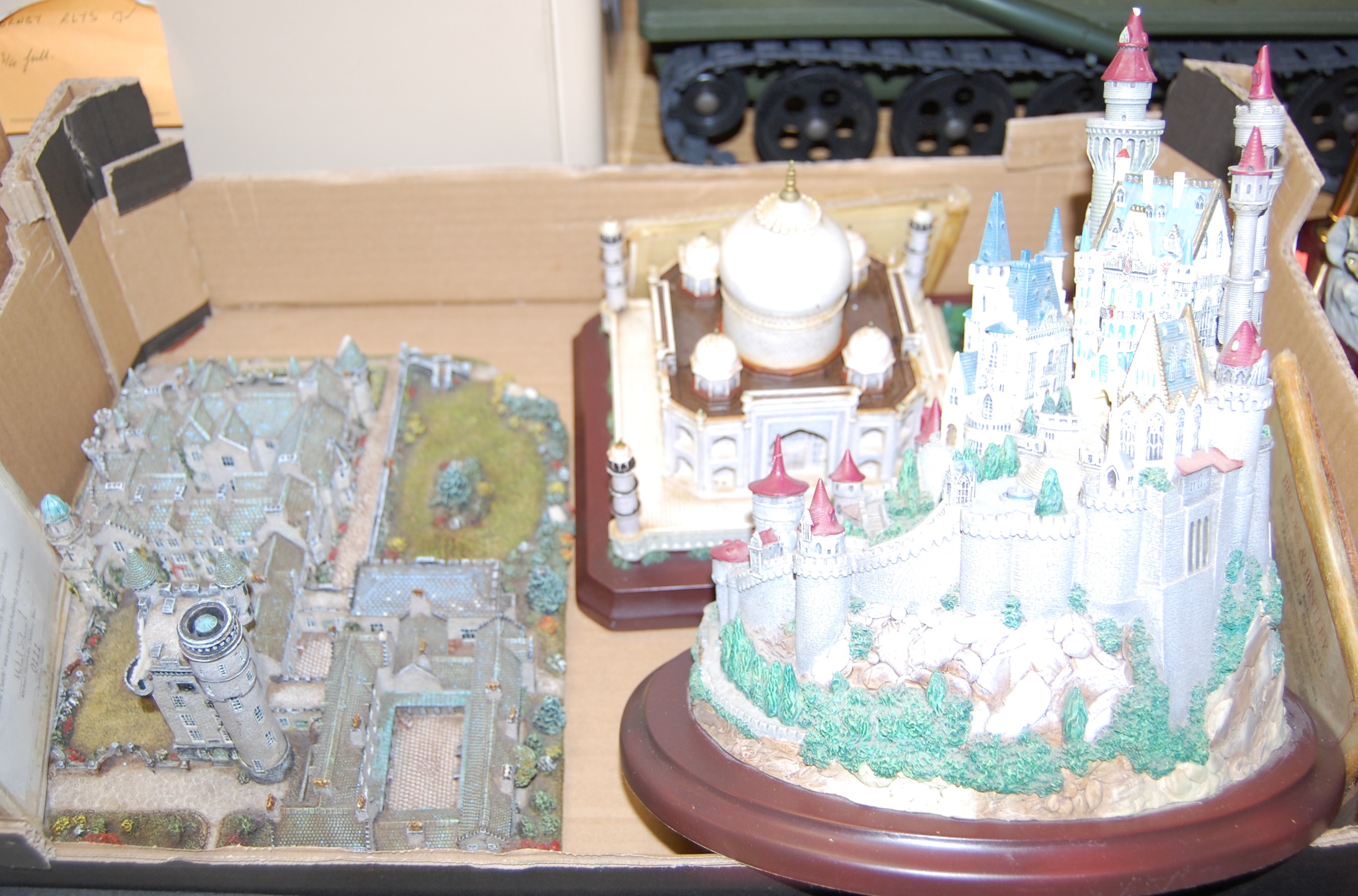 A scale model of Balmoral Castle by Danbury Mint, together with two Brooks & Bentley scale models of