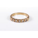 A 9ct gold half hoop diamond ring, total estimated approx. 0.15cts, with plain band stamped with