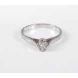 A platinum diamond solitaire ring, the round brilliant cut diamond, estimated approx. 0.06cts,