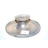 A silver capstan inkwell, on loaded base, dia.15cm