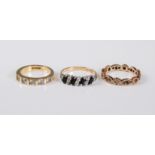 Three 9ct gold rings: a 9ct five stone diamond ring, estimated approx. 0.50cts, size K; a 9ct