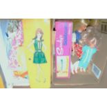 A box of 1970s and later Sindy dolls and accessories, to include clothes, cased sideboard by