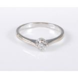 A 9ct gold diamond solitaire ring, the round brillinat cut diamond, estiamted approx. 0.20cts,