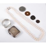 A two strand cultured pearl necklace, the uniform pearls, approx. 6.8mm, with cultured pearl clasp