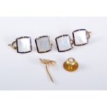 A 15ct gold cultured pearl collar stud, two pairs of 9ct mother of pearl and blue enamel buttons,