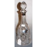 A modern cut glass decanter and stopper, having a silver collar, with silver decanter label for Gin