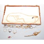 A collection of miscellaneous costume jewellery, to include white metal horseshoe charm bracelet