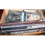 A box of various Scalextric track, to include Le Mans start, magazines etc