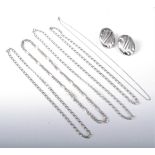 Four silver necklaces, another fine unmarked fine chain necklace and a pair of oval silver