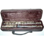 A Windsor three piece flute in fitted case