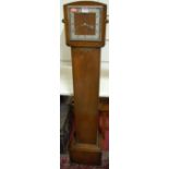 A 1930s oak grand-daughter clock, having a square dial, h.142cm