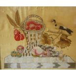 An early 19th century silkwork panel, depicting bird upon a branch with basket of flowers, 34 x