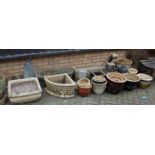 A large collection of various reconstituted stone planters; and various glazed stoneware plant