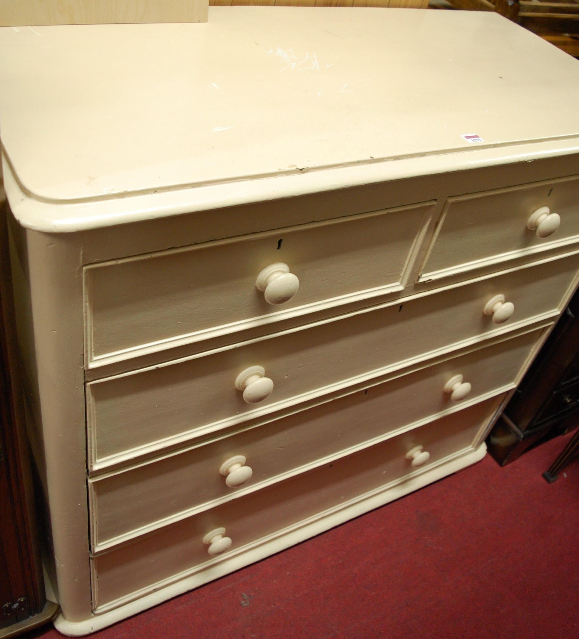 A mid-Victorian cream painted pine round cornered chest of two short over three long drawers, w.