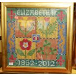 Three modern framed and glazed woolwork studies to include commemorative example