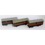 Three Bassett Lowke short bogie coaches LNER teak, 1st class no. 525, 3rd class no. 235, full