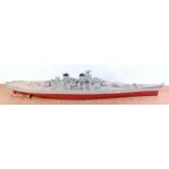 A large plastic kit built and radio controlled model of USS Missouri, hand painted in grey, cream